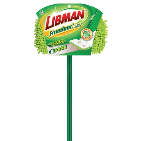 Dust mop with green fibers and handle